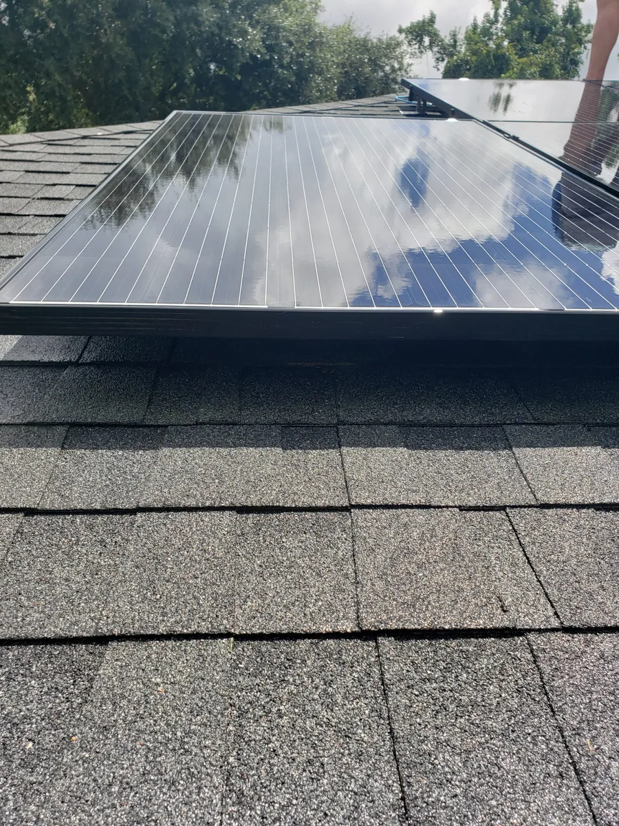 Clean solar panels reflecting the sky